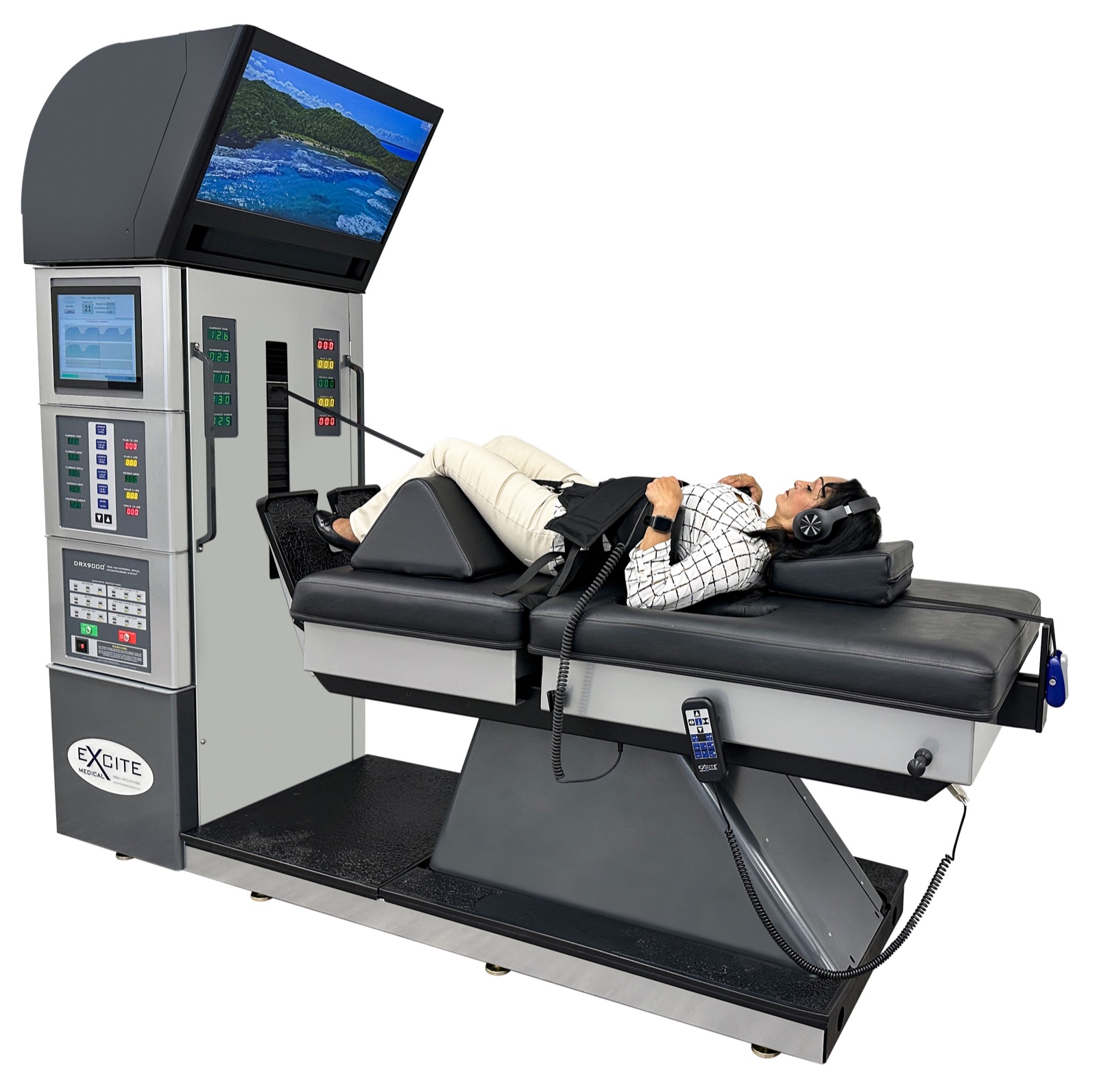 Patient relaxing with headphones during lumbar spinal decompression on the DRX9000